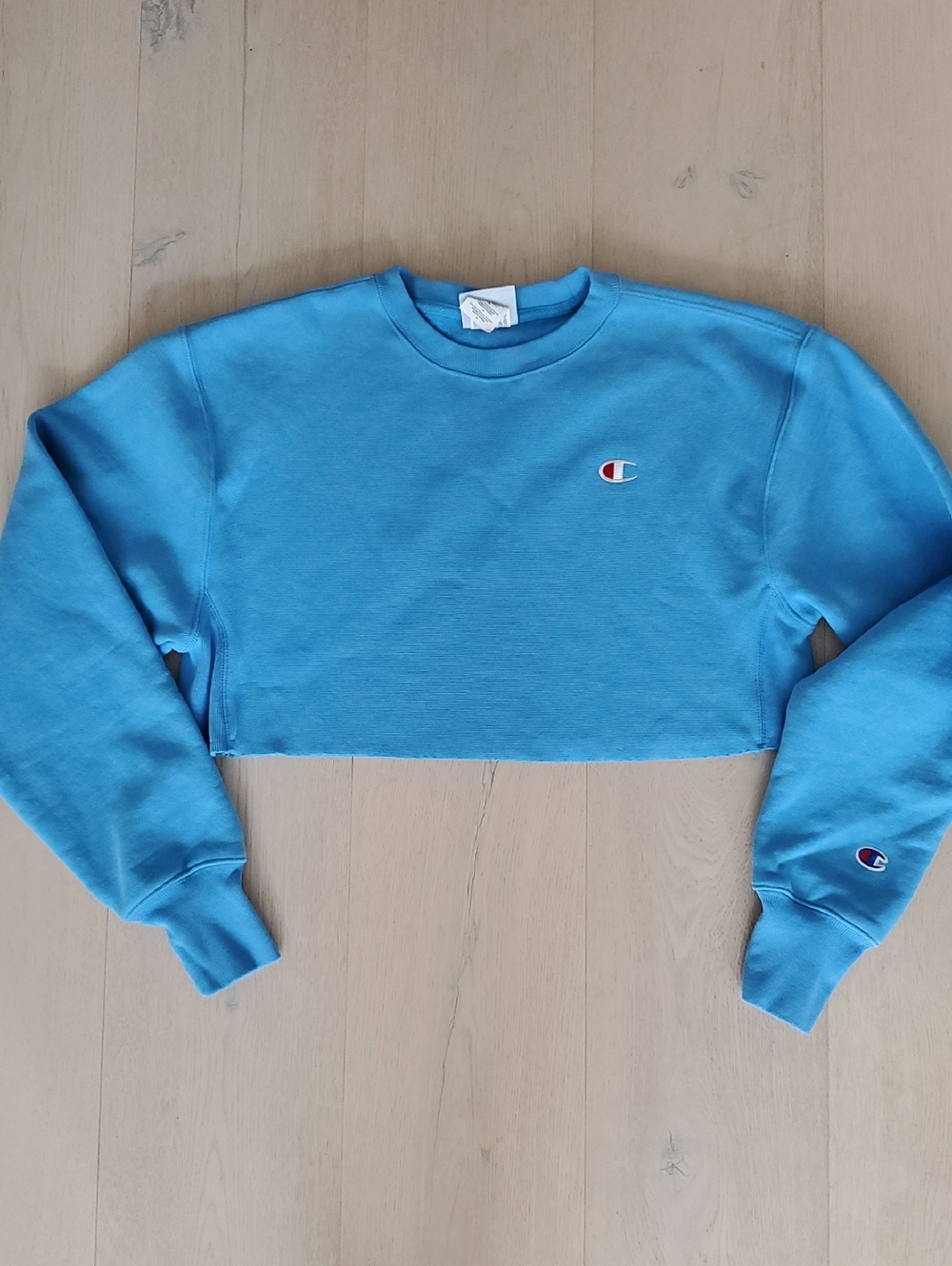 Champion- NWOT Sky Blue Cropped Crew 84% Cotton Long Sleeve XS